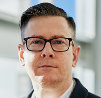 Alexander Hughes, CEO i dyrektor firmy handlującej kryptowalutami, portret
